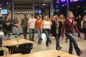 Kat Nichols (left) leads a line-dancing class at Ashwood Taps and Trucks on Wednesday, March 1, 2023. (Doug Flanagan/Post-Record)