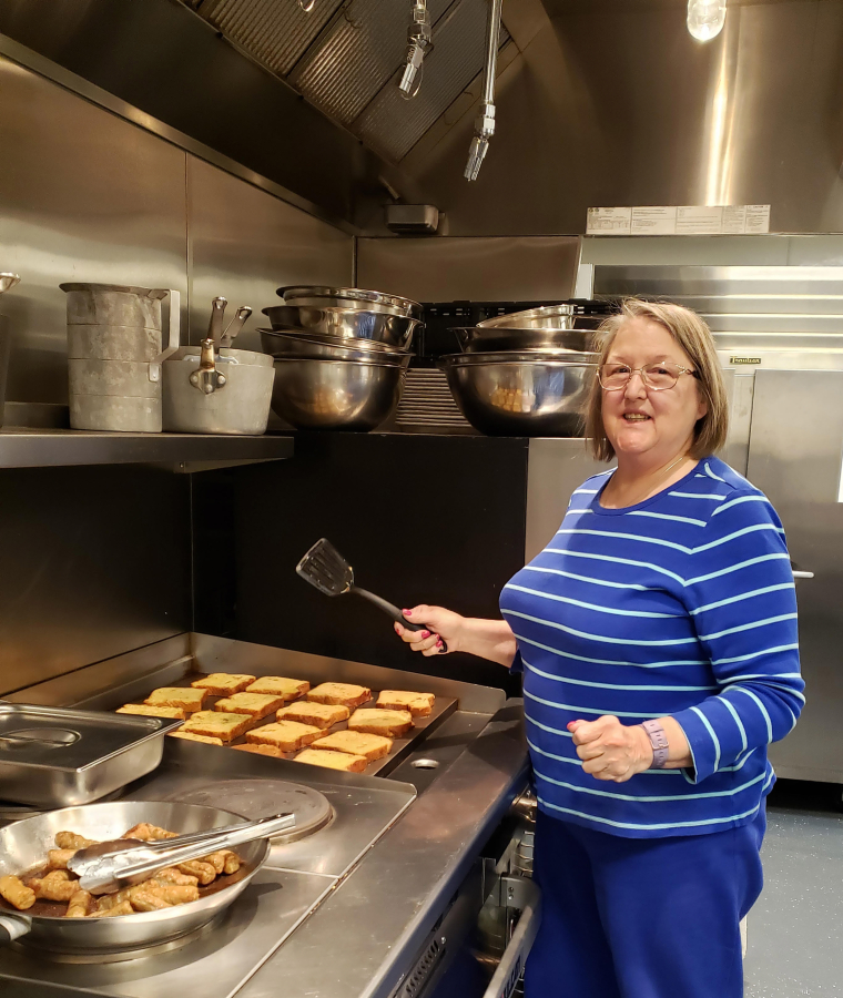 Washougal resident Fran Whitmeyer prepares breakfast for guests of ReFuel Washougal&#039;s severe weather shelter.