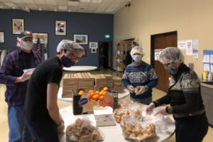 ReFuel Washougal volunteers prepare meals for their Friday night guests. (Contributed photo courtesy of Fran Whitmeyer)