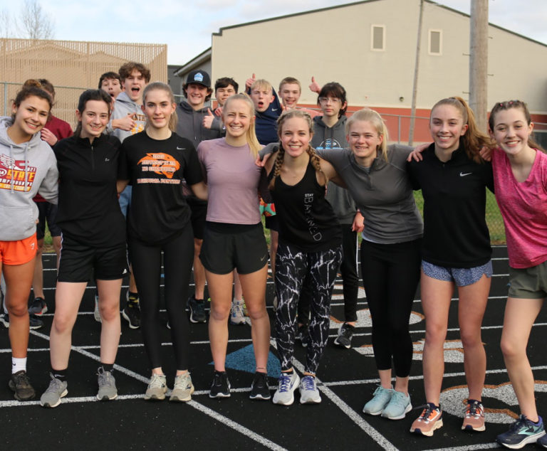 Members of the Washougal High School track and field team pose for a photograph in March 2023.