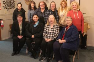 Volunteers for the Washougal Society for Advancement and Family Enrichment pose for a photo after a meeting at The Outpost in Washougal in January. Front row, left to right:
Margaret McCarthy, Karress LaFrance, Pat Suggs and Pam Clark. Back row, left to right: Irene Sam, Heidi Kramer, Penny Porche, Nancy Nass-Boon, Sandie Renner and Ann Stevens. (Doug Flanagan/Post-Record)