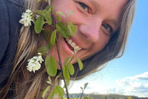 Contributed photo courtesy Hannah Schrager 
 Washougal resident Hannah Schrager shows off a Western serviceberry plant at Good Year Farms in April 2022.