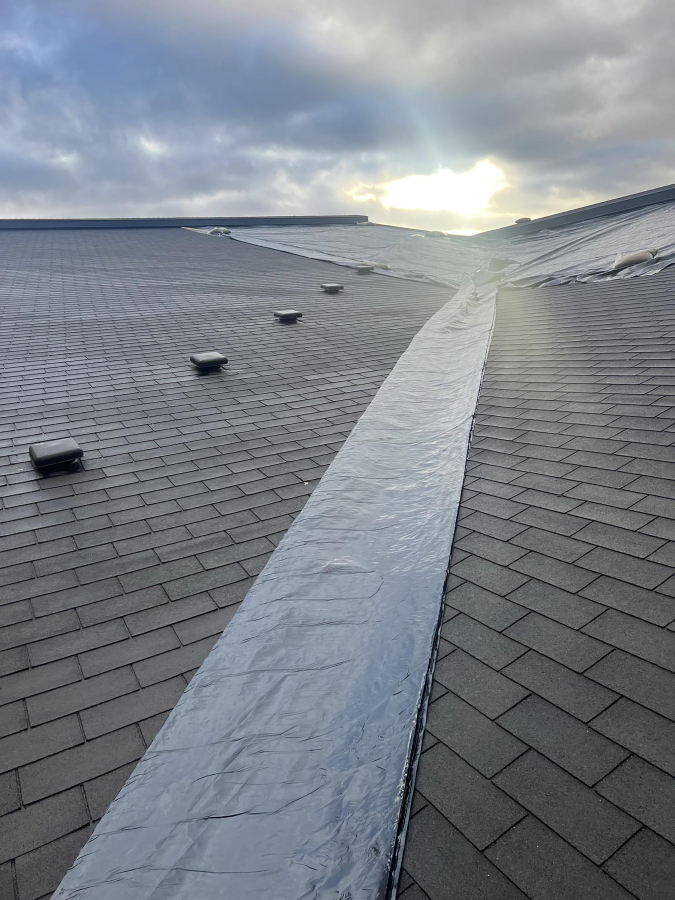 Contributed photo courtesy Washougal School District 
 Tarps cover a portion of Washougal High School&#039;s roof in January.