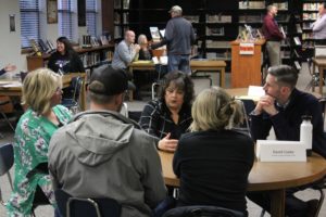 Washougal School District Director of Teaching and Learning Tracey MacLachlan (center) talks to attendees at the school district's "listening tour," held Tuesday, March 28, 2023, at Washougal High School. (Doug Flanagan/Post-Record)
