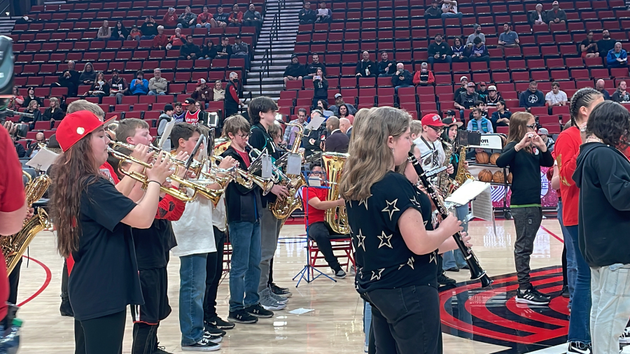 Members of the Jemtegaard Middle School wind ensemble perform Wednesday, March 29, 2023, at the Moda Center in Portland, Ore., before the start of the Portland Trail Blazers' basketball game against the Sacramento Kings. (Contributed photo courtesy of Jennifer Hodapp)