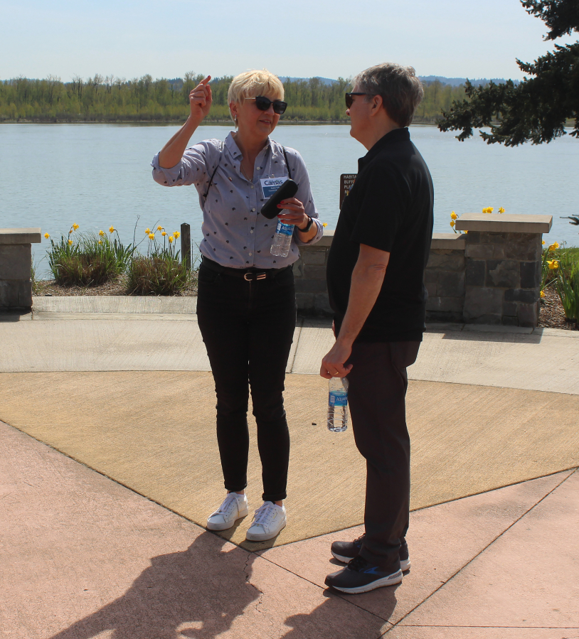 Roma Toft (left) speaks with Washougal City Manager David Scott April 26, 2023, at Washougal Waterfront Park. Toft, a resident of Zielonki, Poland, visited Washougal in April 2023, after the two municipalities agreed to form a 