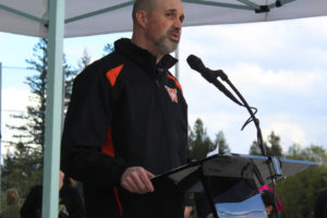 Washougal School Board President Cory Chase speaks April 22, 2022, during an opening ceremony for the George Schmid Ballfields. (Doug Flanagan/Post-Record)