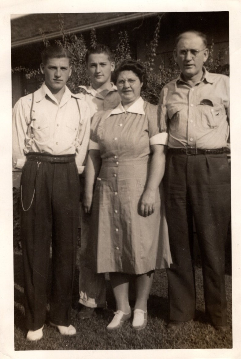 John and Arthur Reynolds stand in front of their Camas home with their parents, Mary and Joseph Reynolds, in the late 1930s or early 1940s. (Contributed photo courtesy of Christina Reynolds Price) 