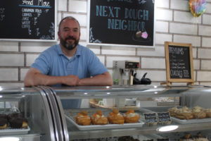 Next Dough Neighbor owner Matt Schultz works inside his downtown Camas doughnut shop on Saturday, May 27, 2023. (Photos by Kelly Moyer/Post-Record)