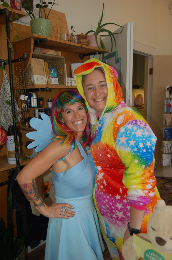 LiveWell Camas owner Jacquie Hill (right) and instructor Allie Baden (left) dress up for the June 2022 First Friday event in downtown Camas on June 3, 2022.