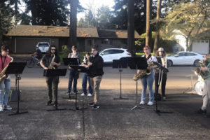 The Washougal High School jazz ensemble performs April 25, 2023, in the driveway of Ray Johnson's Vancouver residence. (photos courtesy of Blake Perkins)