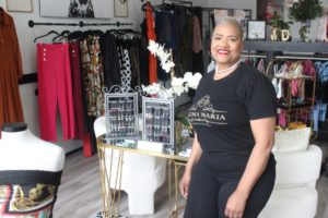 Doug Flanagan/Post-Record 
 Dakima Hicks poses for a photograph at her downtown Washougal botique, which opened for business earlier this month. (Doug Flanagan/Post-Record)