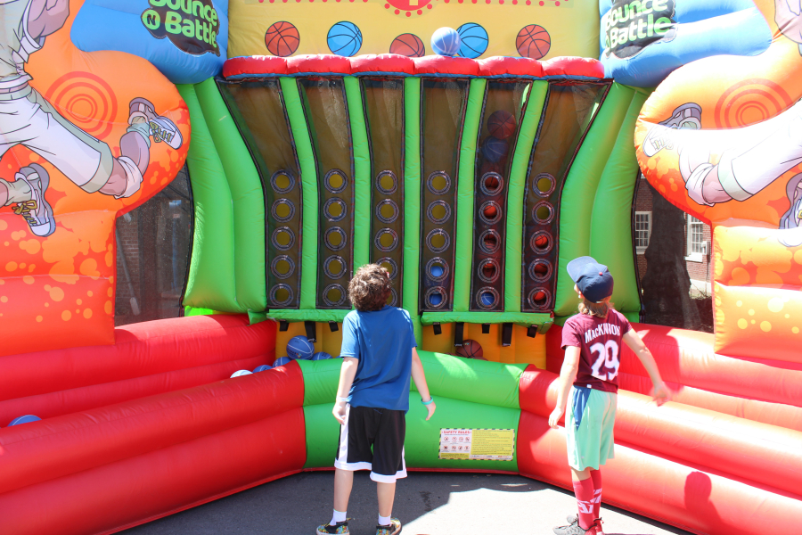 Children shoot basketballs at a 2023 Camas Days Kids Street attraction in downtown Camas Friday, July 21, 2023. The annual Camas Days celebration, held throughout downtown Camas July 21-22, 2023, featured family friendly entertainment, parades, vendors and live music at the nightly beer-and-wine garden. (Doug Flanagan-Post-Record)