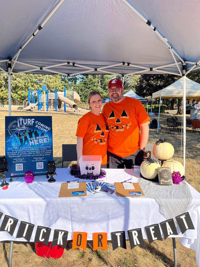 Wasougal residents Ann (left) and Grant Gilson pose for a photo during the city of Washougal's Harvest Festival event in October 2022. The Gilsons attended the event to promote their efforts to bring a teen center to Washougal. (Contributed photo courtesy of Grant Gilson)