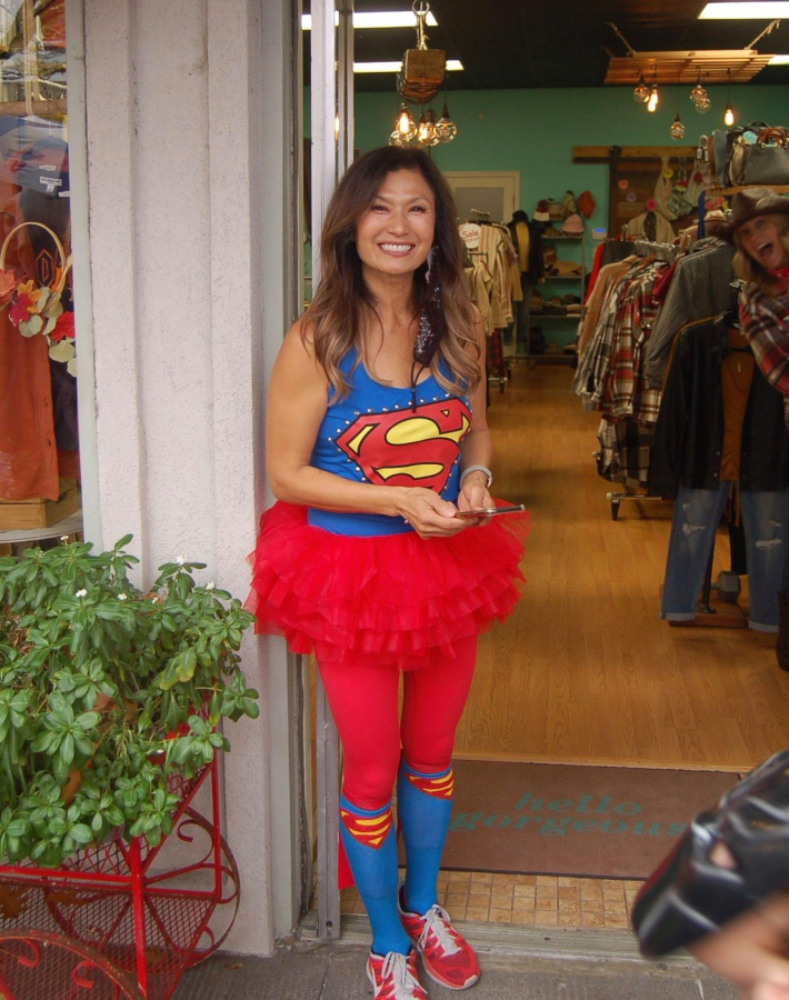 Allure Boutique owner Bobbi Lee dresses as Supergirl during a Camas First Friday event. (Photos courtesy of the Downtown Camas Association)