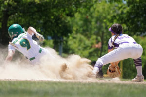Greenberry Lady A's 12UA player Norah Chambers (left) slides into second base during a game held during the 2022-23 season. (Contributed photo courtesy of Jeanette Blunt)