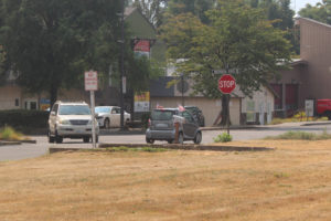 Vehicles drive by the future location of the Vancouver Housing Authority housing complex at the corner of 