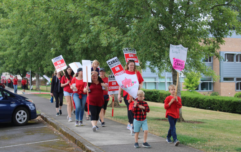 Camas teachers and their supporters walk the picket line near Helen Baller Elementary School in Camas Monday, Aug. 28, 2023.