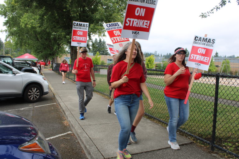 Camas teachers walk the picket line near Helen Baller Elementary School Monday, Aug. 28, 2023. The teachers are striking over classroom sizes, cost-of-living salary increases and equitable funding for music, health, physical education and library programs.