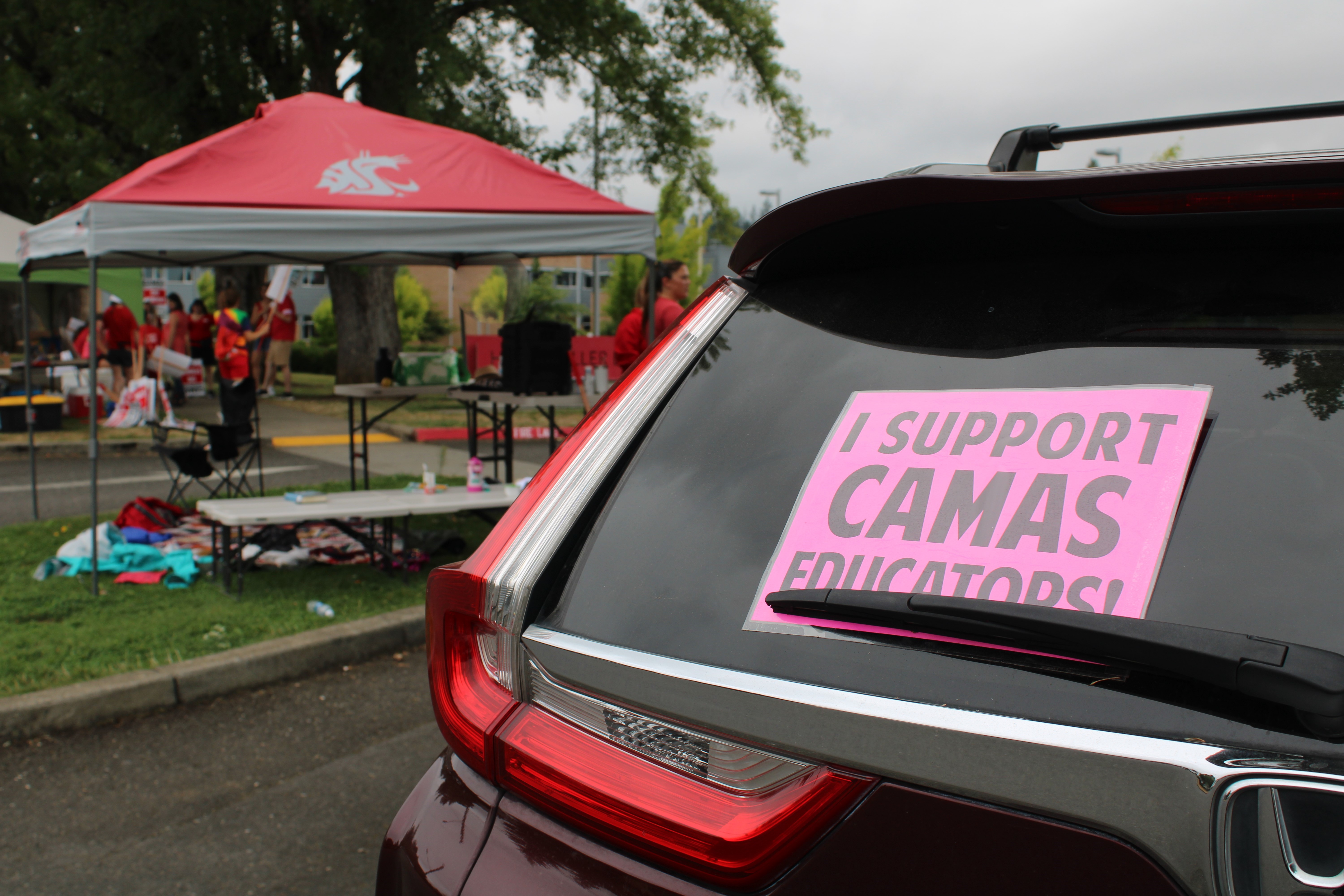 A sign in the back of a vehicle parked near Helen Baller Elementary School in Camas shows support for Camas teachers on strike for better wages, classroom sizes and more Monday, Aug. 28, 2023. (Kelly Moyer/Post-Record)  