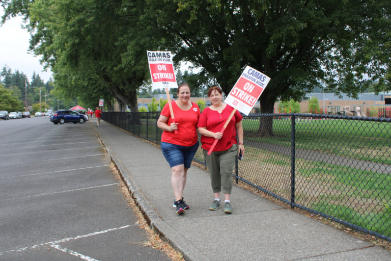 Two Helen Baller Elementary School educators, Shelley Youngblood (left) and Shelley Lee, the former president of the Camas Education Association, hit the picket line outside Helen Baller Monday, Aug. 28, 2023.