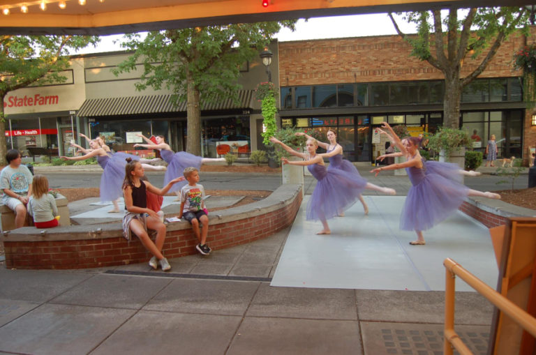 Dancers from the Camas-based Virtuosity Dance studio perform in front of the Liberty Theatre in 2022.