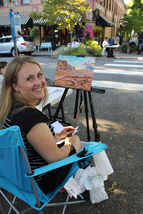 Camas artist Erin Johnson works on a landscape painting in downtown Camas Friday, Sept. 1, 2023, during the Camas Gallery's annual "plein air" art event.