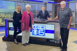 Camas resident Wayne Havrelly (second from right) is joined at the KOIN news studios in Portland Aug. 27, 2023, by his wife Julie (far left), mother Sandy (second from left) and father Gus (far right) for the final newscast of his 40-year broadcasting career. (Contributed photo courtesy of Wayne Havrelly)