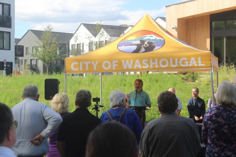 Doug Flanagan/Post-Record 
 Port of Camas-Washougal commissioner John Spencer (center) talks during a grand-opening ceremony for Eagle View Park in Washougal on Thursday, Sept. 7.