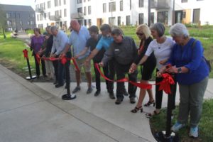 From left to right, Washougal City Councilwoman Michelle Wagner, Washougal City Councilwoman Janice Killion, Holst Architecture owner Kevin Valk, Washougal City Councilman Ernie Suggs, Washougal Mayor David Stuebe, Killian Pacific Development Manager Adam Fractor, Port of Camas-Washougal Commissioner John Spencer, Port of Camas-Washougal Commissioner Larry Keister, Washougal School District Superintendent Mary Templeton, Port of Camas-Washougal Commissioner Cassi Marshall and Washougal City Councilwoman Molly Coston cut a ribbon during a grand-opening ceremony at Eagle View Park in Washougal Thursday, Sept. 7, 2023. (Doug Flanagan/Post-Record)