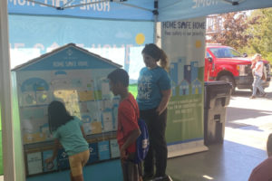 Visitors to the Camas-Washougal Fire Department's 2022 open house and safety fair browse NW Natural's 