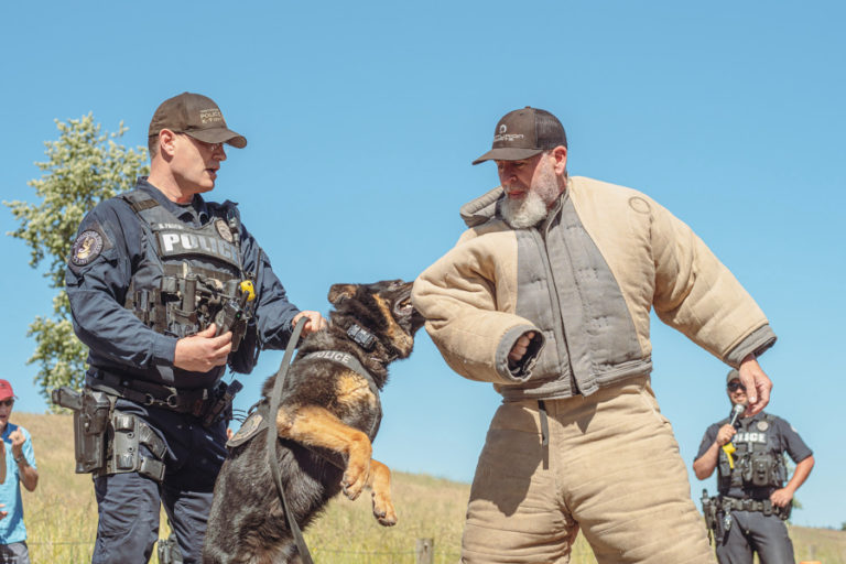 Law enforcement officers and their "K-9" partners demonstrate techniques at the June 2022 Hike on the Dike fundraising event in Washougal.