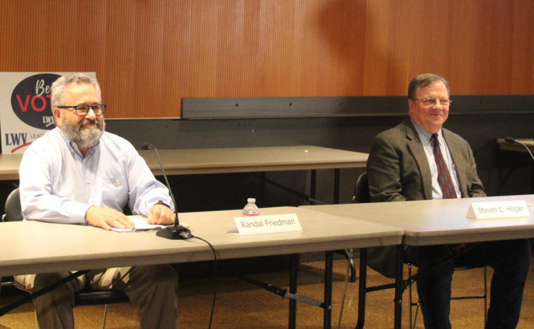 Camas Mayor Steve Hogan (right) and his challenger in the Nov. 7, 2023, general election, Randal Friedman (left) prepare to answer questions during a League of Women Voters candidate forum held Oct. 4, 2023, at the Vancouver Community Library.