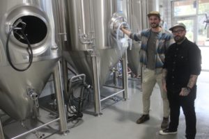 Recluse Brew Works owner/brewer August Everson (left) and tasting room manager Richard LaRue pose for a photo at the Washougal brewery, Friday, Oct. 20, 2023. (Doug Flanagan/Post-Record)