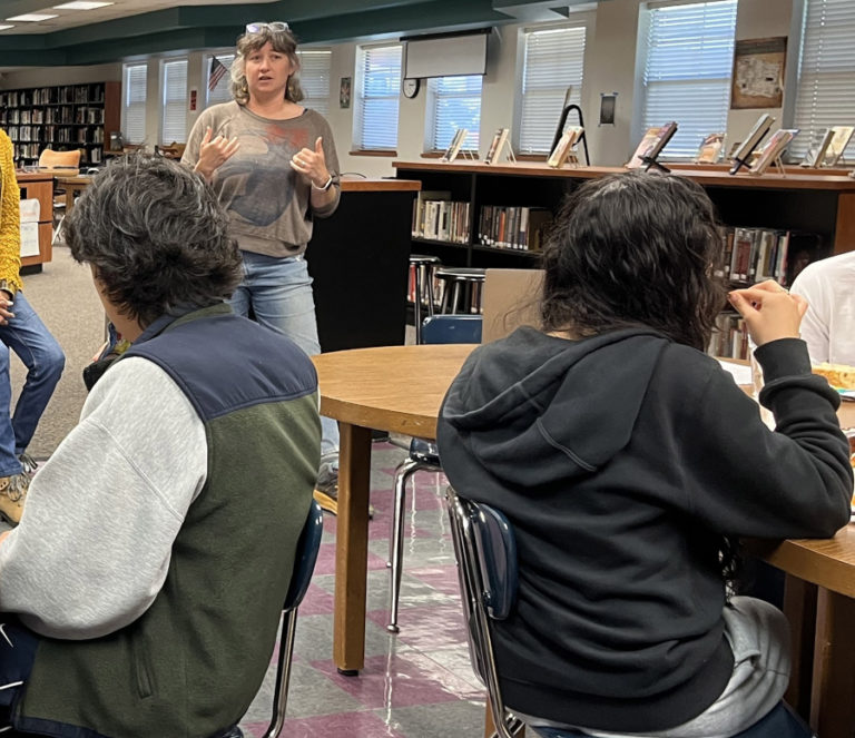 Contributed photo courtesy East County Citizens Alliance
East County Citizens Alliance (ECCA) volunteer Annie Soutter talks to Washougal High School students about ECCA's Hamllik Park mural project earlier this year.