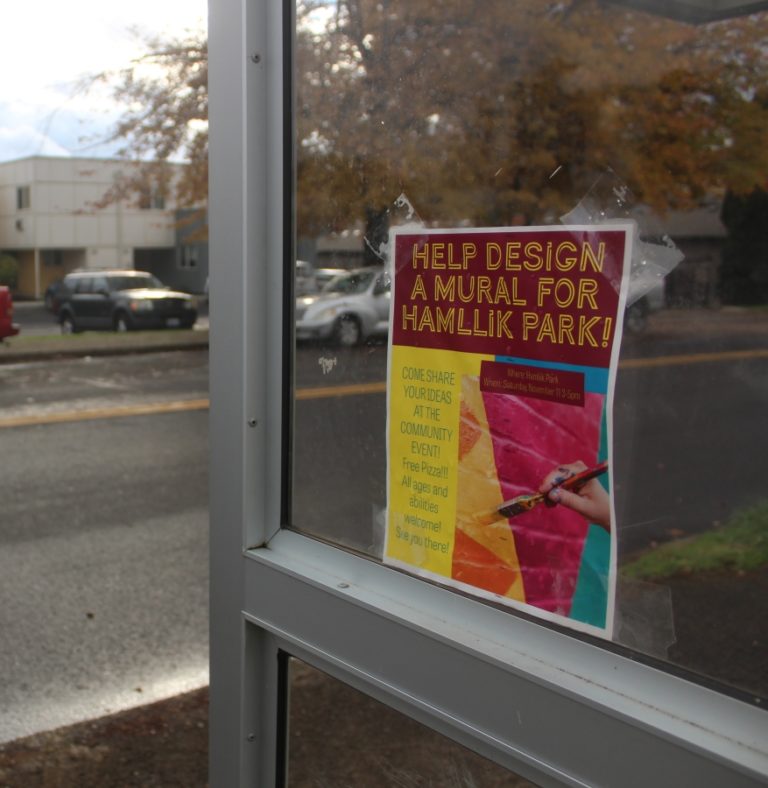 Doug Flanagan/Post-Record 
 A flier advertising the details of a community brainstorming event for a mural at Hamlliik Park is taped to the side of a bus stop at the park on Thursday, Nov. 2. (Doug Flanagan/Post-Record)