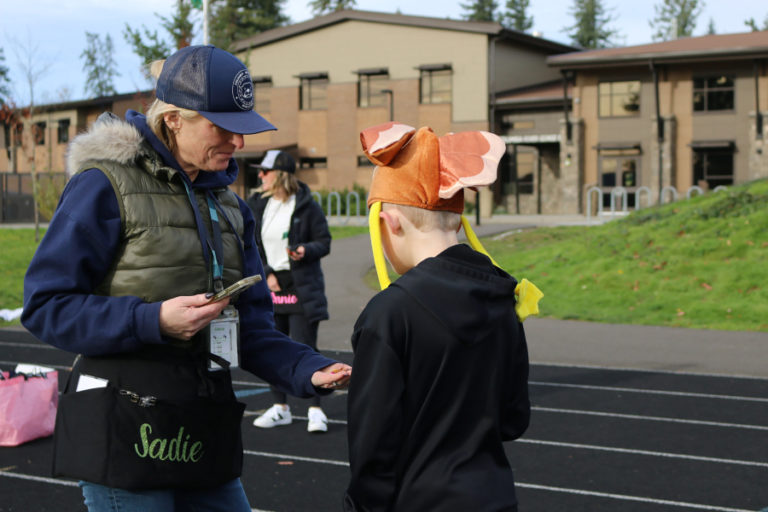 Contributed photo courtesy Washougal School District 
 Washougal School Board member Sadie McKenzie (left) serves as the co-coordinator for the Columbia River Gorge Elementary School's Boosters Mileage Club.