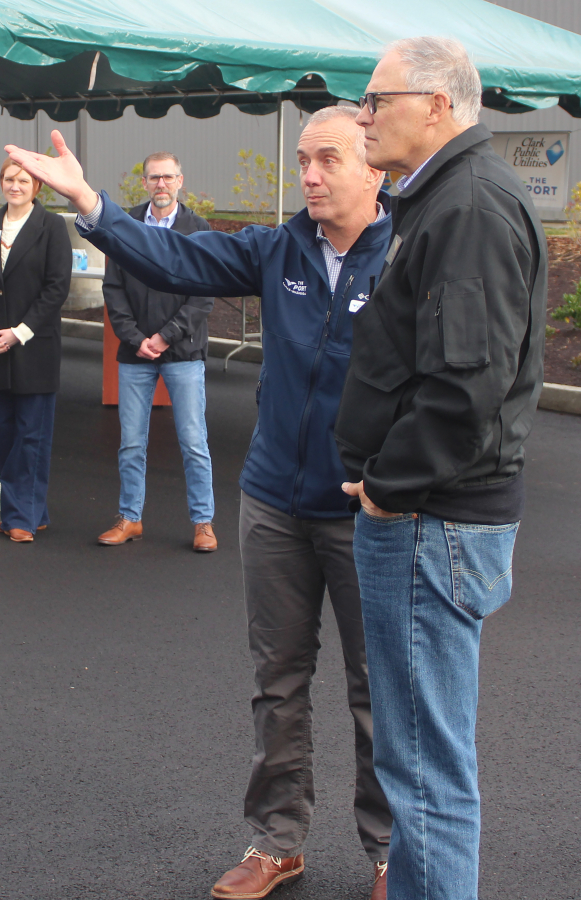 Washington Gov. Jay Inslee (right) talks to Port of Camas-Washougal CEO David Ripp at the Port's industrial park, Friday, Jan.