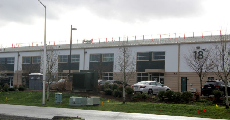 Solar panels adorn the roof of Building 18 at the Port of Camas-Washougal industrial park in Washougal, Friday, Jan.