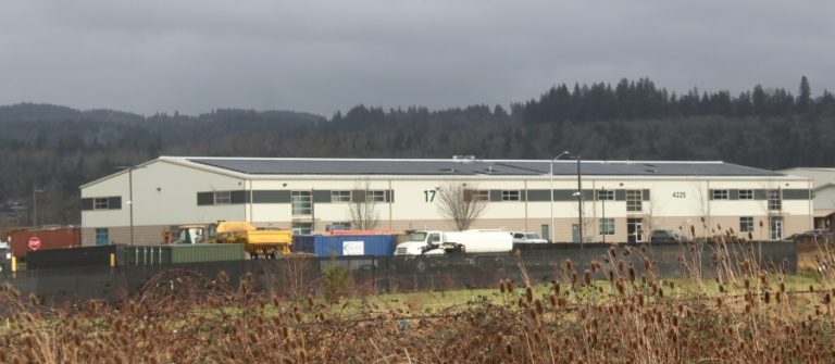 Solar panels adorn the roof of Building 17 at the Port of Camas-Washougal's industrial park in Washougal, Friday, Jan.