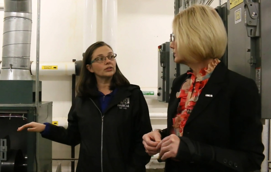 Washougal School District maintenance supervisor Jessica Beehner (left) talks with superintendent Mary Templeton in Washougal High School's boiler room in 2023. (Post-Record file photo)