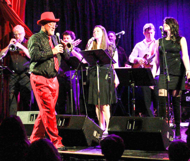 Former Camas resident Phil Hodapp (second from left) performs during a benefit concert put on by The Bitchins, a Portland-based rock-and-horn band that plays a benefit concert once a year to raise money for Parkinson's Resources of Oregon.
