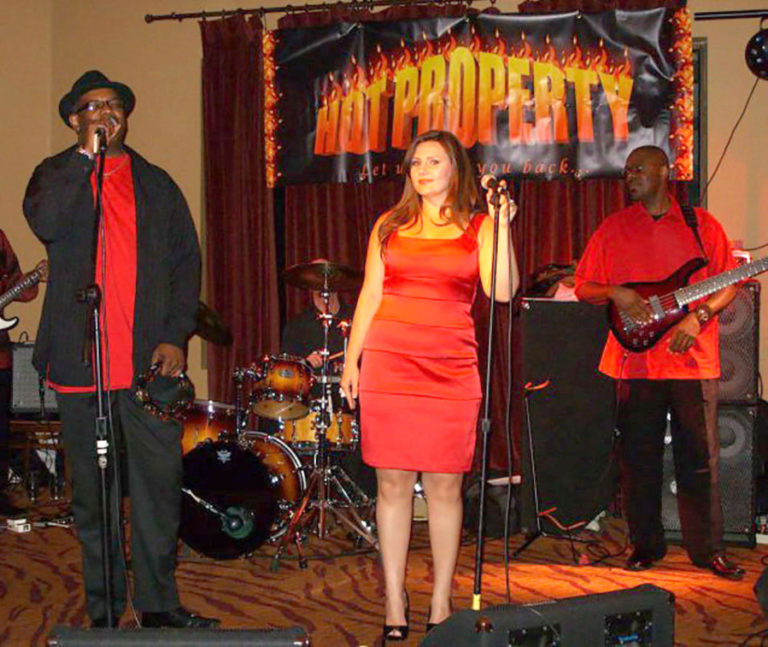 Washougal native Angela Bunda (center) sang lead vocals for a Clark County band, The Hot Property, from 2004 to 2015.