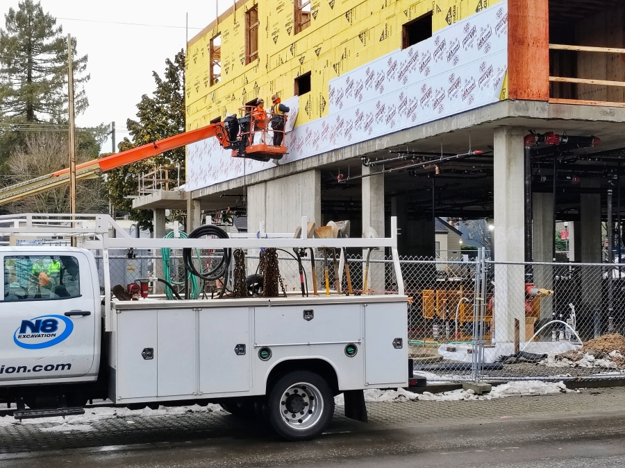 Doug Flanagan/Post-Record 
 Employees of Walsh Construction, a Portland-based construction company, work on a mixed-use building in downtown Washougal on Monday, Jan. 22, 2024. (Doug Flanagan/Post-Record)