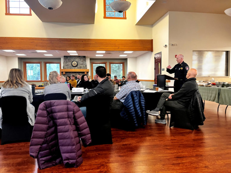 Camas-Washougal Fire Chief Cliff Free (right, standing) speaks to members of the Camas City Council and other city leaders about plans to build a new Camas-Washougal Fire Department headquarters fire station in downtown Camas, during the Council's 2024 planning workshop at Lacamas Lake Lodge in Camas, Friday, Jan. 26, 2024.