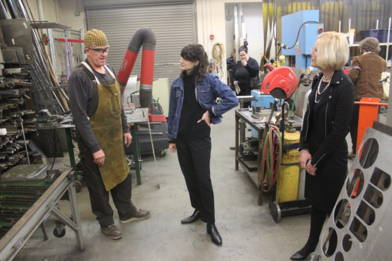 U.S. Rep. Marie Gluesenkamp Perez, D-Skamania (center) talks with Washougal High School metal shop teacher Don O'Brien (left) and Washougal School District Superintendent Mary Templeton at Washougal High on Wednesday, Jan. 24.