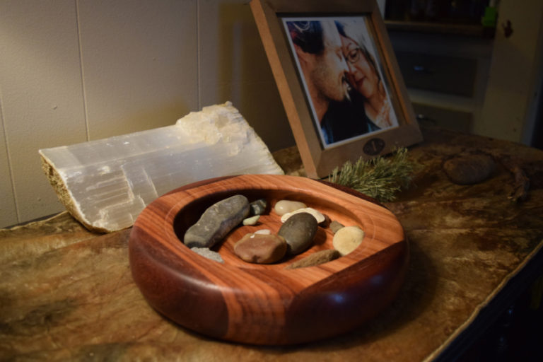 Washougal artist John Furniss created "Jupiter," a bowl made of padauk wood that sits on a hallway table in his home. John and his wife, Anni, collect rocks from the hikes that they go on and keep them in the bowl. Sunday, Feb. 25, 2018.