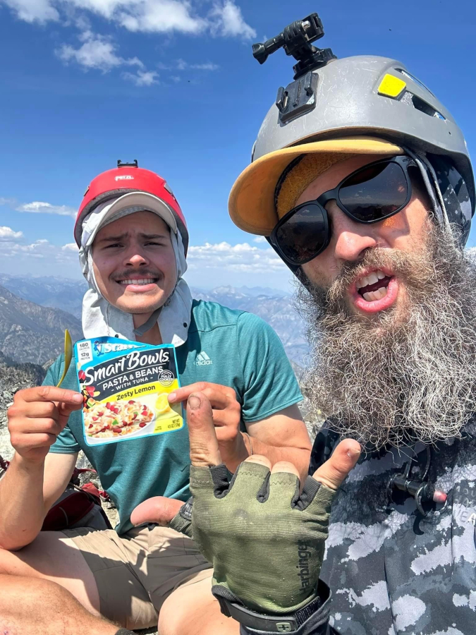 Andrew Okerlund (left), of Camas, and Ross James Wallette (right) show the type of food they ate while climbing Washington state's highest peaks during the summer of 2023.