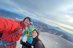 Andrew Okerlund (left) stands on top of Mount St. Helens with his brother, Vaughn Okerlund (center), and Kevin Hsu in September 2023. (Contributed photo courtesy of Andrew Okerlund) 