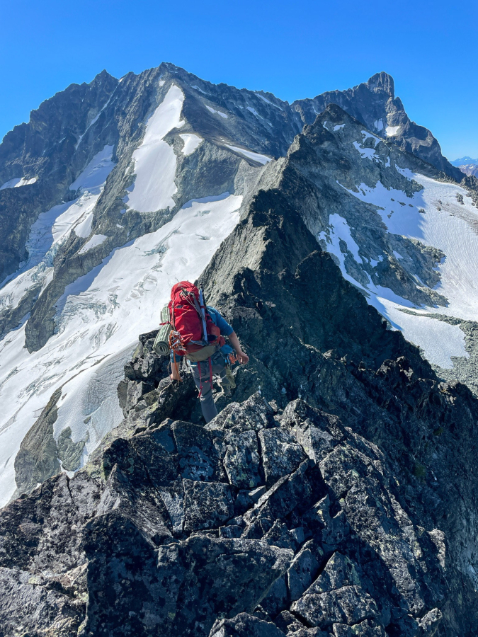 Andrew Okerlund, 20, of Camas, traverses Bonanza Peak from Dark Peak in the summer of 2023.